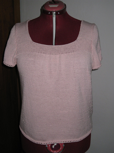 Feminin bluse med blomst