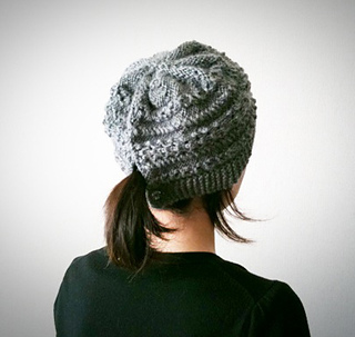 Ravelry: p.10 Cable stitch hat (ケーブルの髪結び帽子) pattern by