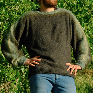 Masculine fit size XL. Wearer is 6'2" with 38" chest.