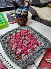 I used the Walmart gray acrylic yarn to surround and connect all the squares. I'll use it for the eyes.