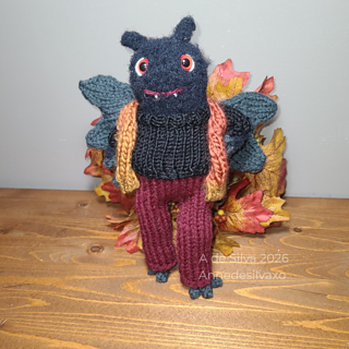 First version. This autumnal outfit isn't included. Antenna were knit with i-cord.
Wanted to show a less spooky version of him