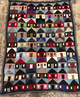7 houses across, 9 houses high.