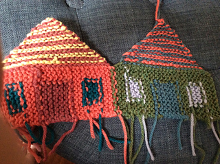 Start new color by carrying it from the beginning of the row for windows and door, makes for a neater back and less weaving in