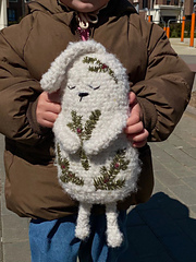 Big cute bunny with embroidery stuffed toy for little children from curly boucle yarn crochet amigurumi pattern 