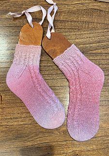 68 stitch - Medium Size. Made with eye of partridge heel option and fully cabled back of leg. 