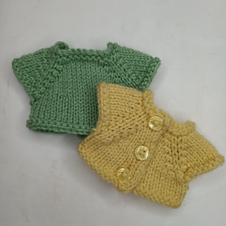 Green T- shirt shows front view.
Yellow T-shirt back view