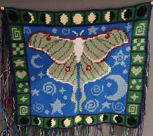 Whimsical lunar moth tapestry