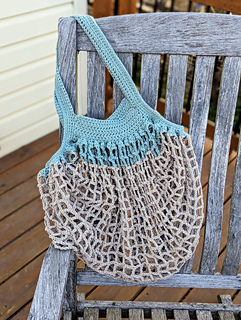 You can see where I ran out of tan and started using blue on the net. On the other side the blue starts at the handle.