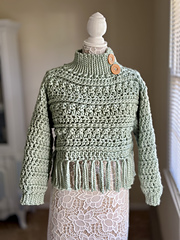 Pictured is Yarn Bee Dream Supreme in the color Tea.