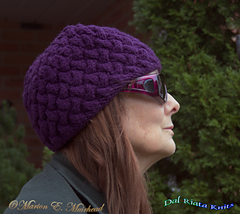 This Cable Weave Beanie worked in purple Loops & Threads Impeccable is a good weight for cool weather.