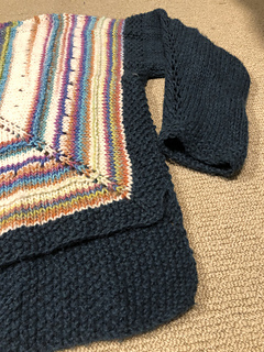 Moss stitch contrast hems, back longer than front