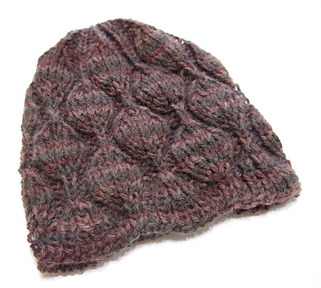 Ravelry Embossed Leaves Hat for Straight Needles pattern by Heather Tucker