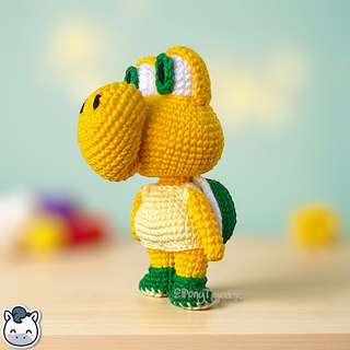 Handmade Koopa amigurumi inspired by Nintendo’s Super Mario, a cute crochet pattern PDF perfect for retro gaming fans and geek collectors.
