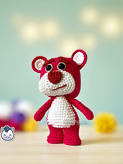 Handmade Lotso amigurumi inspired by Disney Pixar’s Toy Story, a perfect pink strawberry bear crochet pattern PDF for geek fans and plush collectors.