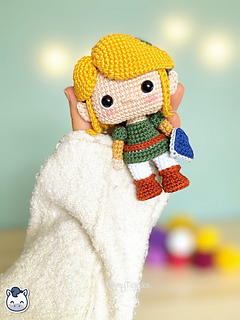 Handmade Link amigurumi inspired by Nintendo’s The Legend of Zelda, a perfect pattern for fans of classic fantasy adventures and geek crochet.
