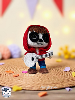 Handmade Coco amigurumi inspired by Disney Pixar’s Coco, a perfect crochet pattern for fans of Día de Muertos, Mexican culture and Disney classics.