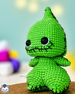 Handmade Oogie Boogie amigurumi inspired by Tim Burton’s The Nightmare Before Christmas, a perfect crochet pattern for Halloween fans and Disney lovers.