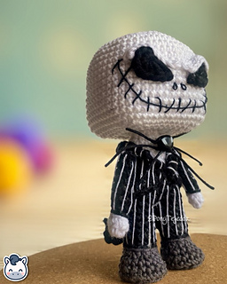 Handmade Jack Skellington amigurumi inspired by Tim Burton’s The Nightmare Before Christmas, spooky Halloween crochet pattern PDF.
