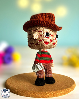 Handmade Freddy Krueger amigurumi inspired by Wes Craven’s A Nightmare on Elm Street, spooky Halloween crochet pattern PDF.