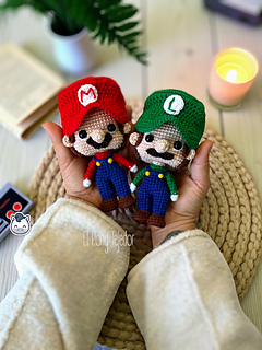 Handmade Mario and Luigi amigurumi inspired by Nintendo’s Super Mario Bros, a perfect crochet pattern for fans of classic video games and geek culture.