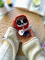 Handmade Coco amigurumi inspired by Disney Pixar’s Coco, a perfect crochet pattern for fans of Día de Muertos, Mexican culture and Disney classics.