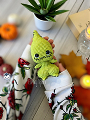 Handmade Oogie Boogie amigurumi inspired by Tim Burton’s The Nightmare Before Christmas, a perfect crochet pattern for Halloween fans and Disney lovers.