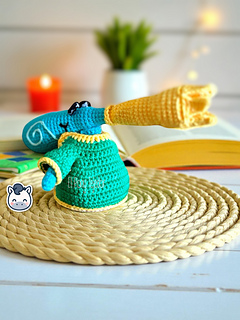 Handmade Rayman amigurumi inspired by Ubisoft’s iconic video game series, a perfect geeky crochet pattern PDF for fans of retro platform games.