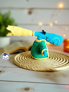 Handmade Rayman amigurumi inspired by Ubisoft’s iconic video game series, a perfect geeky crochet pattern PDF for fans of retro platform games.