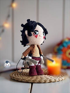 Handmade Eren Jaeger amigurumi inspired by Hajime Isayama’s Attack on Titan (Shingeki no Kyojin), a perfect crochet pattern for anime fans, otaku collections, and Funko-style plush lovers.