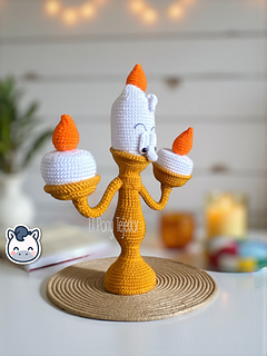 Handmade Lumière amigurumi inspired by Disney’s Beauty and the Beast, a perfect pattern for fairy tale and Disney fans who love magical and vintage aesthetics.