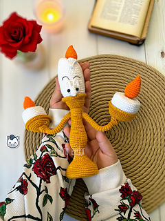 Handmade Lumière amigurumi inspired by Disney’s Beauty and the Beast, a perfect pattern for fairy tale and Disney fans who love magical and vintage aesthetics.