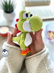 Handmade Yoshi amigurumi inspired by Nintendo’s Super Mario Bros, a perfect pattern for fans of Mario, Mushroom Kingdom adventures and retro gaming.