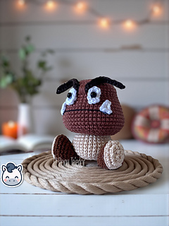 Handmade Goomba amigurumi inspired by Nintendo’s Super Mario Bros, a cute geek crochet pattern PDF perfect for retro video game fans and collectors.