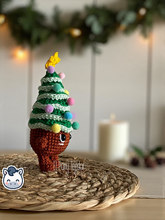 Handmade Christmas amigurumi set inspired by classic holiday ornaments, featuring a Christmas tree, festive candle and pinecone, perfect Christmas crochet pattern PDF for fans of winter decor and handmade holiday crafts.
