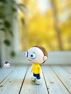 Rick and Morty amigurumi crochet pattern with white lab coat, blue spiky hair and iconic expressions, handmade geek dolls.