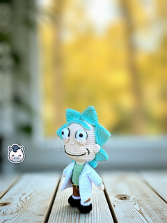 Rick and Morty amigurumi crochet pattern with white lab coat, blue spiky hair and iconic expressions, handmade geek dolls.