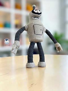 Handmade Bender amigurumi inspired by Matt Groening’s Futurama, a perfect crochet pattern for sci-fi fans and retro animation lovers.