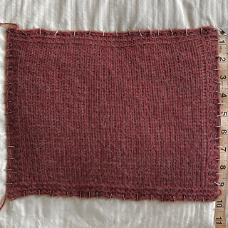 Height during aggressive blocking (as per Worsted Boxy instructions): ~ 10 inches