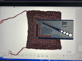 On 5.5mm needles, held double with a strand of MadTosh Prairie, one month after blocking: 16 st x 24 rows
