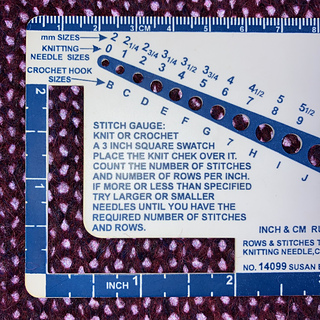 Got gauge (14x20 per 10cm) by wet blocking but not stretching it beyond using wires to straighten the edges and tug it to right-ish angles. 