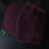 Length after two skeins is 8 inches: 3 inches from skein I also used to make the swatch, and 5 inches from full skein