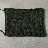 After blocking (did not try to stretch it, just used pins/wires to keep it tidy)