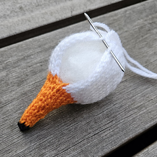 Knitted swan head