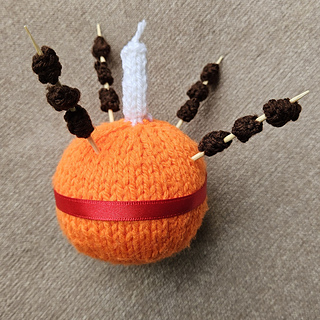 Complete Knitted Christingle with Knitted Candle, Knitted Raisins and Ribbon