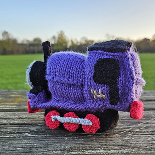 Charlie knitted train toy Outside