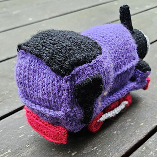 Rear view of Charlie knitted train toy