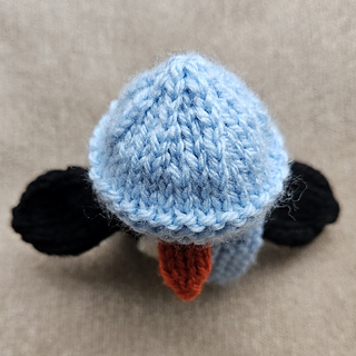 knitted hat for a toy knitted penguin 