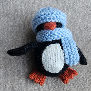 cute knitted penguin toy