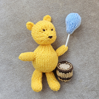Knitted Pooh Bear Toy with Balloon