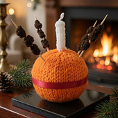 Knitted Christingle for homemade Christmas decoration